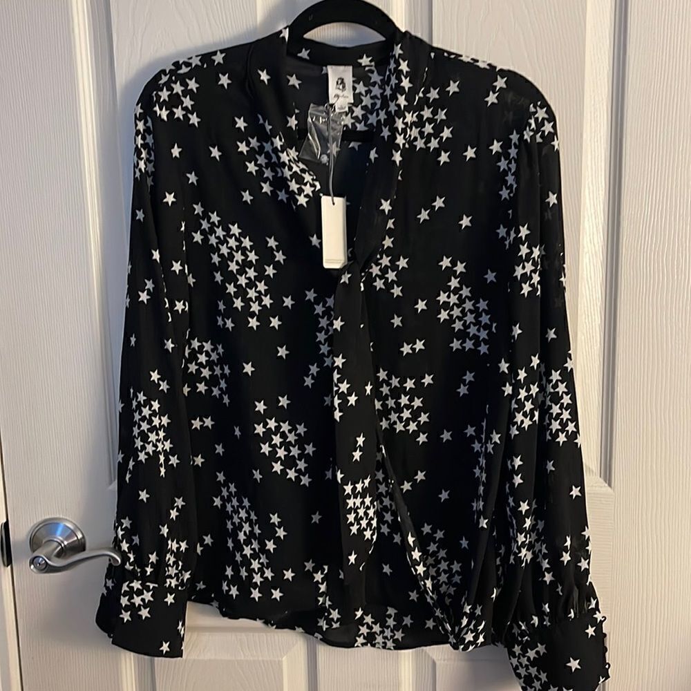 Flawless. NWT size L